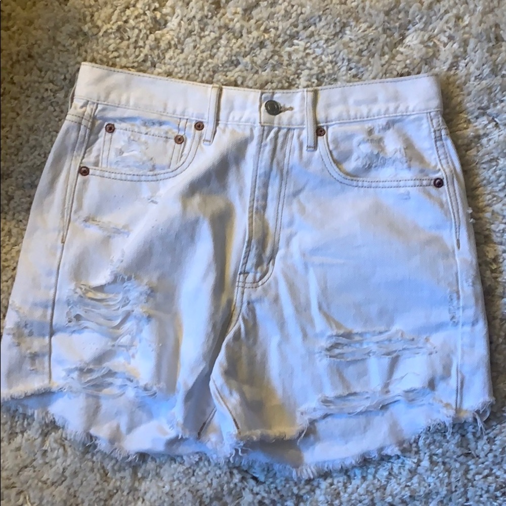 White denim distressed shorts